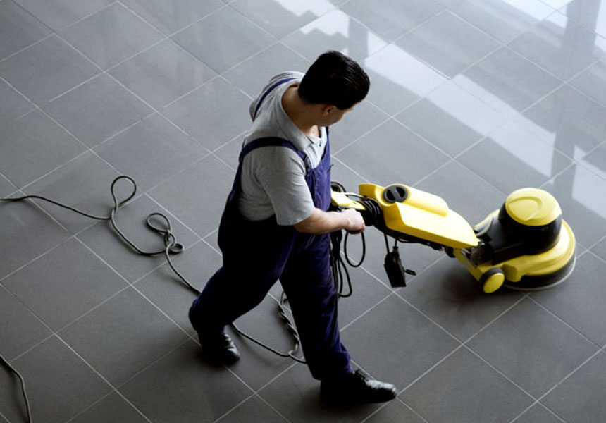 LCS cleaner using commercial floor polisher on commercial floor