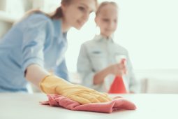 Mother and daughter cleaning