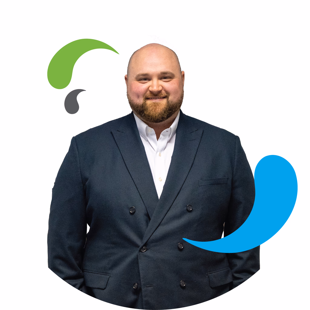 LCS male member of staff with black suit headshot with LCS splash elements from logo
