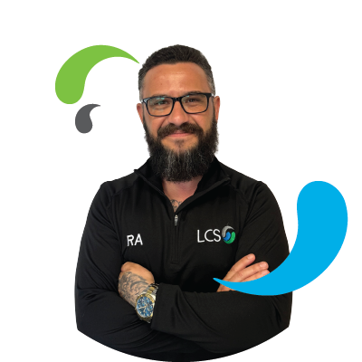 LCS male member of staff headshot with LCS splash elements from logo